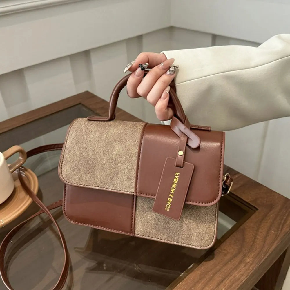 Cartera chica cuadrada de autor