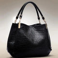Cartera tote animal print cocodrilo